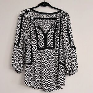 Elegant Black and White Patterned Blouse